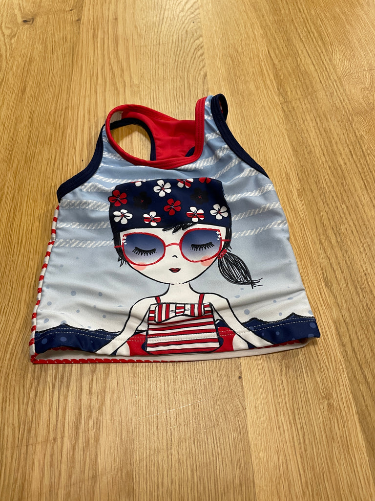 Haut de maillot de bain bleu avec fillette