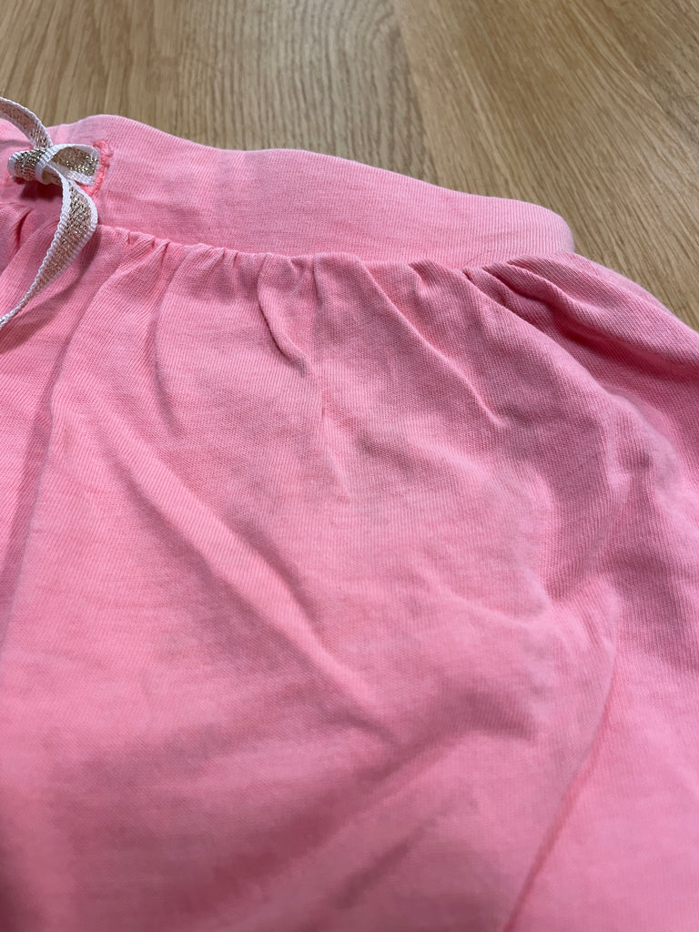 Jupe short rose neoud doré, - DECLASSÈ TACHÈE
