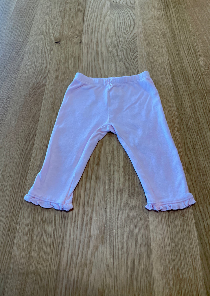 Legging rose avec petit noeud